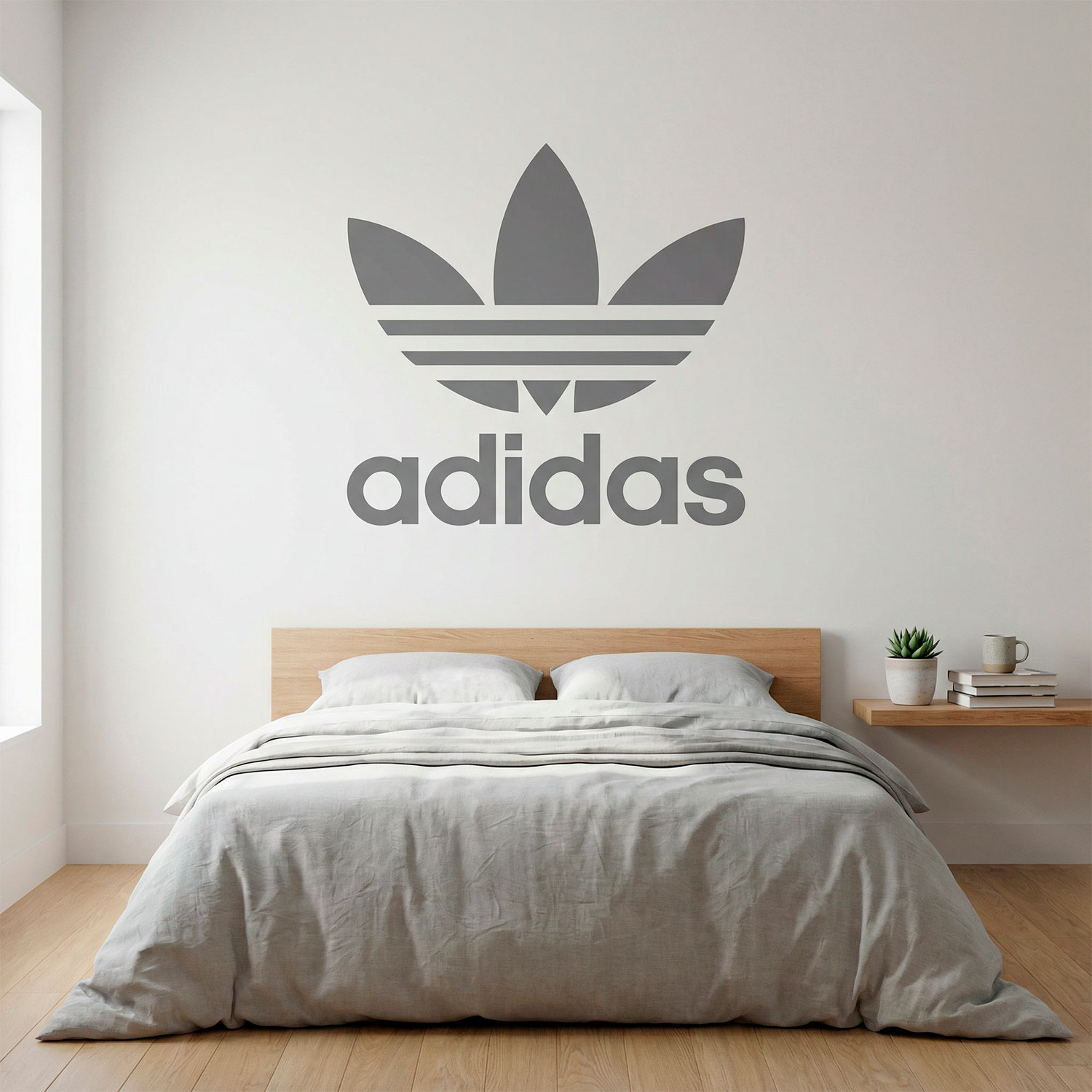 Adesivi Murali: Primo logo di Adidas