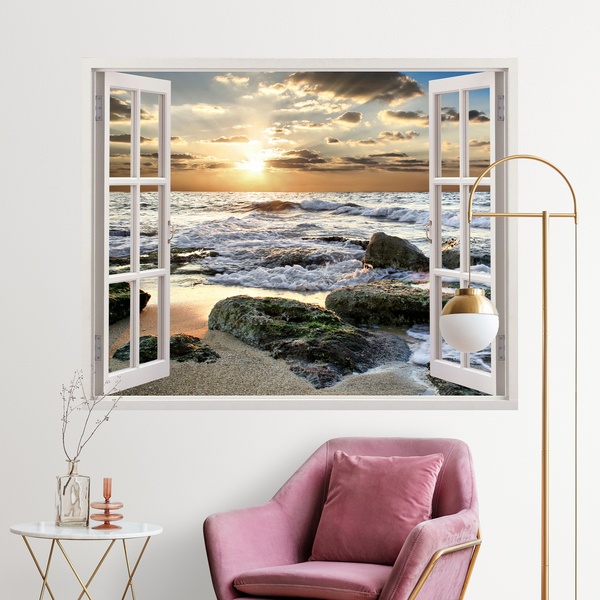 Finestra sul tramonto sul mare con scogli 0