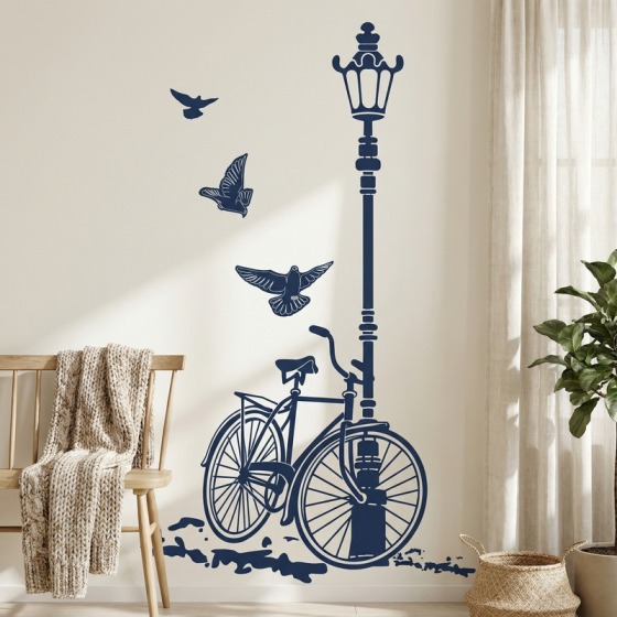 Wall sticker a mandala turchese in bagno, accanto a uno specchio ovale e un lavabo in pietra su mobile in legno